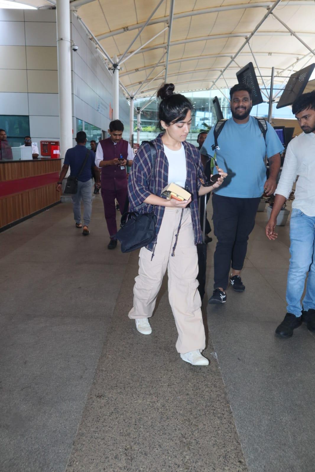 Rashmika Mandana turned heads as she arrived at the airport with a beaming smile and a vibrant aura. 